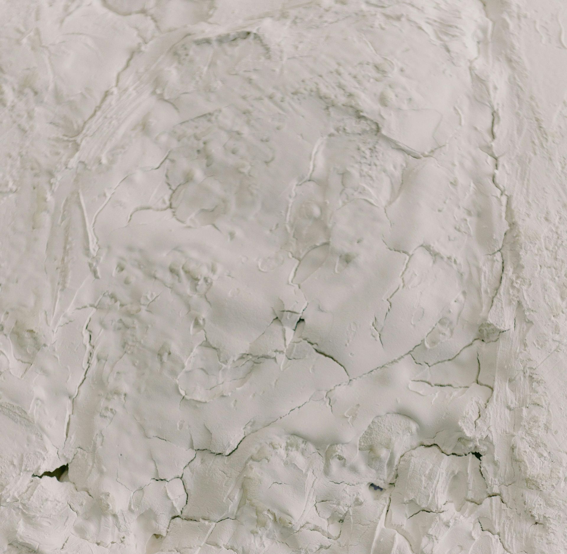 A close up of a pile of white powder on a table.