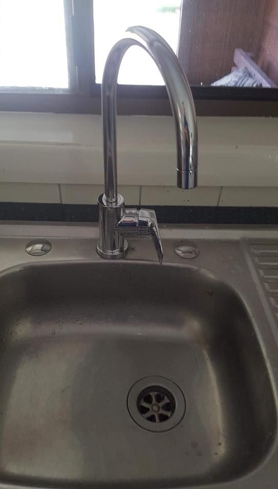 Stainless Steel Sink With Chrome Faucet, Handle Turned Down — Hunter Plumbing And Hotwater in Tanilba Bay, NSW