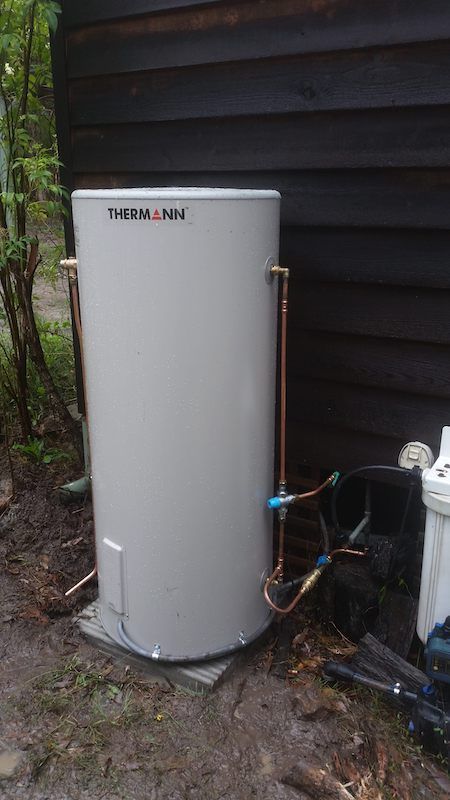 Gray Water Heater With Copper Pipes, Installed Outdoors — Hunter Plumbing And Hotwater in Raymond Terrace, NSW