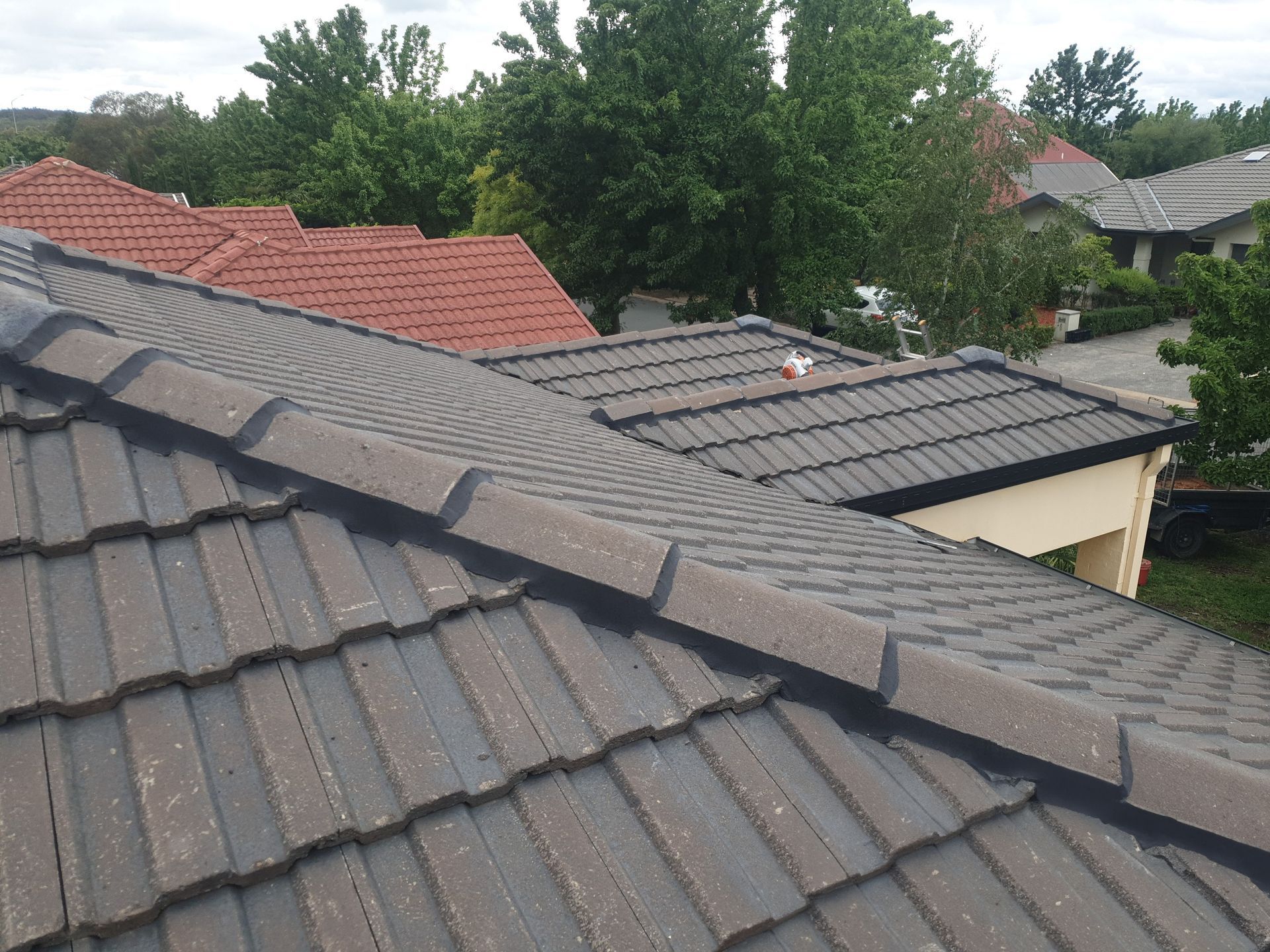 Gray tile roofing — Qualified Roofer in Canberra