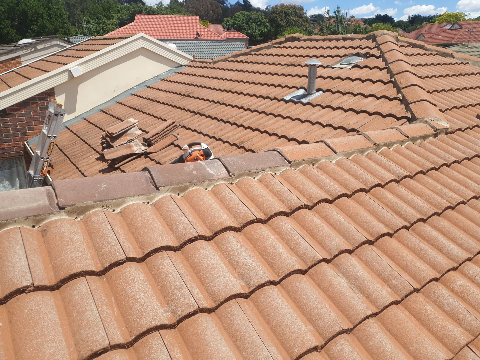Close up view of a tile roof repair — Qualified Roofer in Canberra