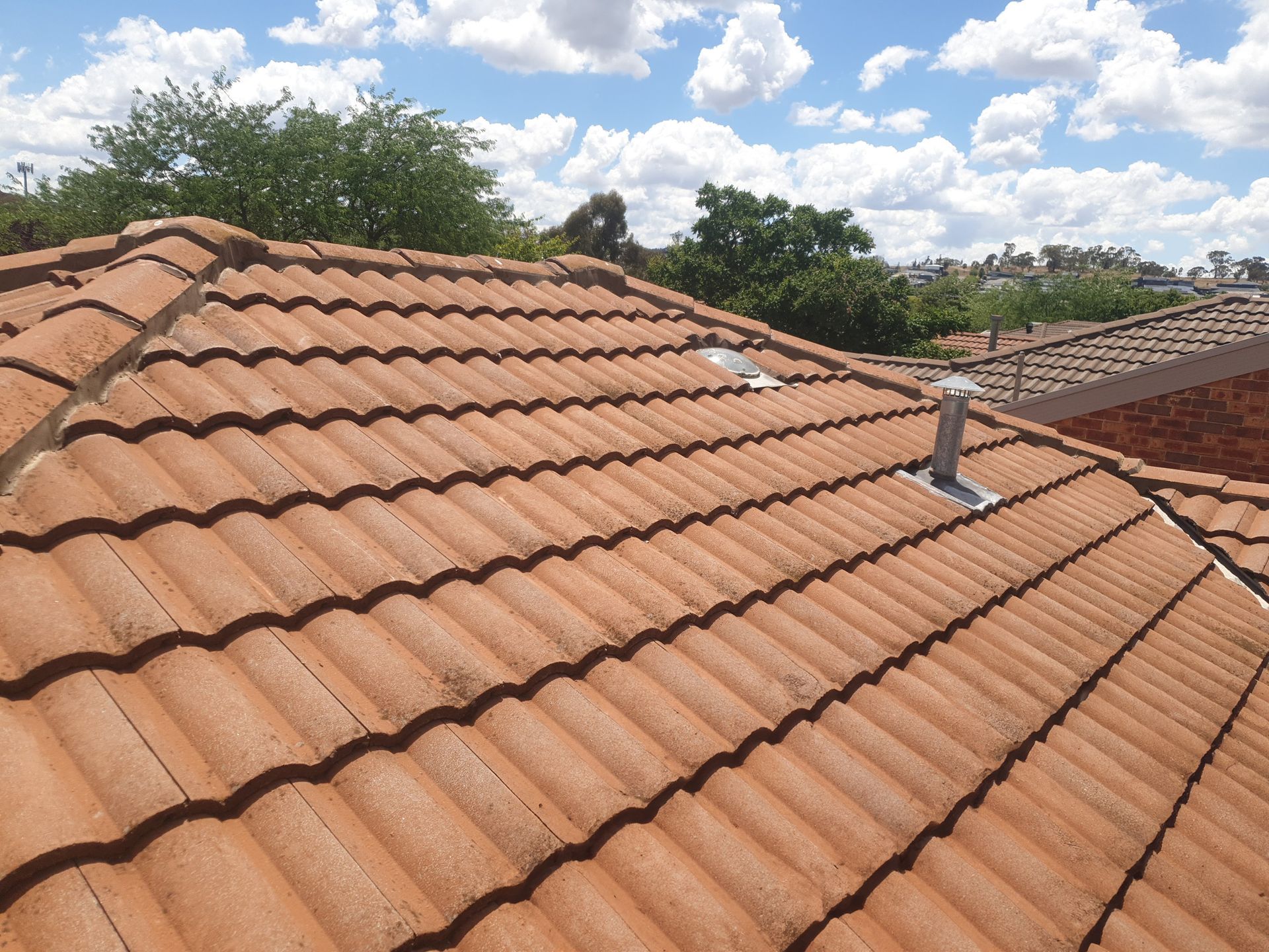The roof of a house with a gutter — Trusted Roofer in Queanbeyan