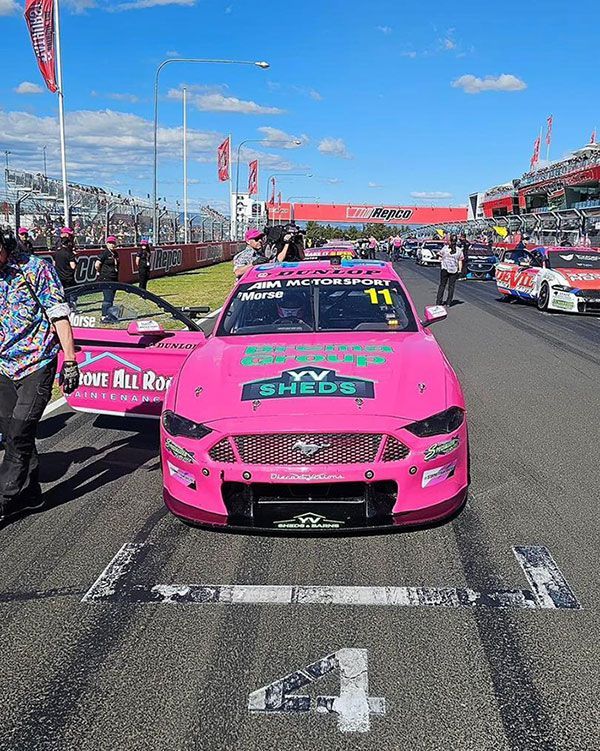 Racecar on the start grid — Qualified Roofer in Canberra