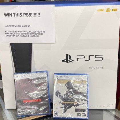 A ps5 is sitting on top of a glass table next to two games.