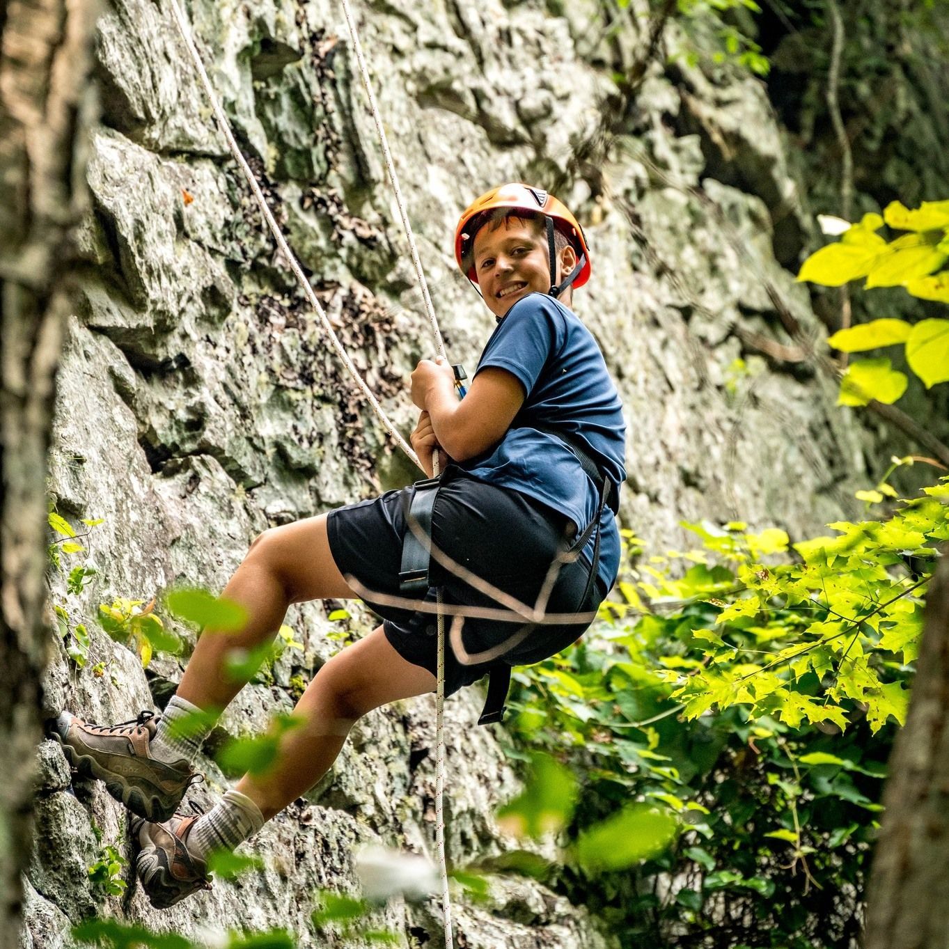boy rock climbing in Duluth