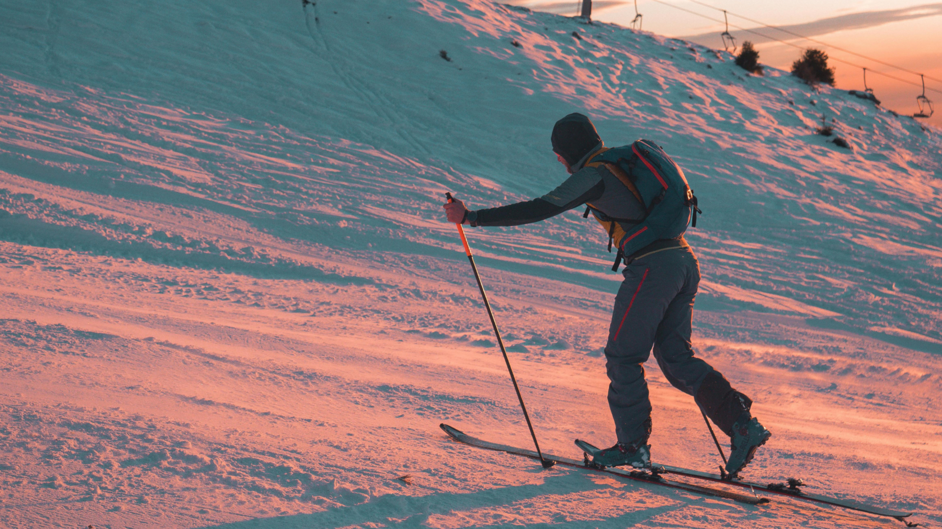 person skiing up a hill