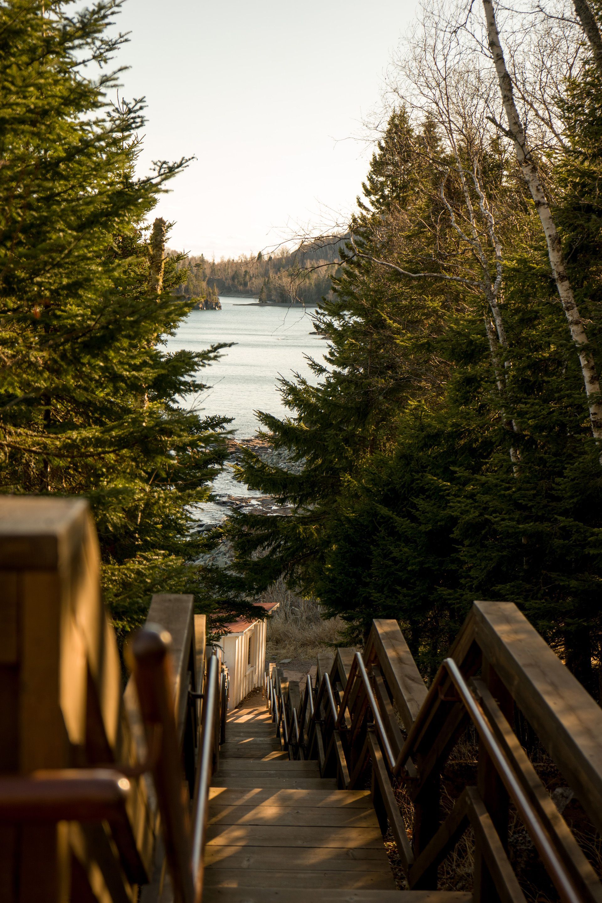 view down a flight of stairs to a lake