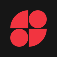 Red abstract logo on black background: Four red shapes, two circles and two curved squares, arranged to resemble a flower.