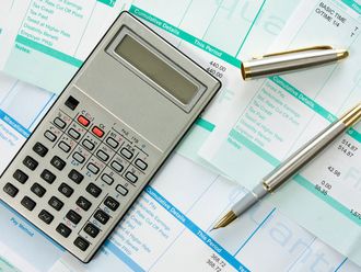 Calculator pen and payroll summary details