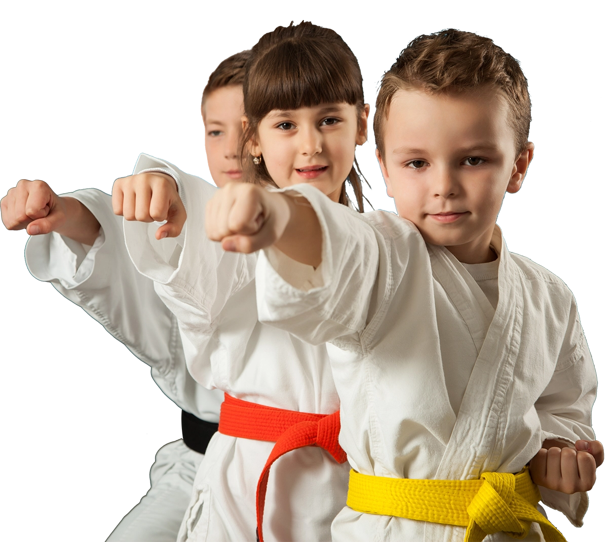 A boy and two girls are wearing karate uniforms and pointing at the camera