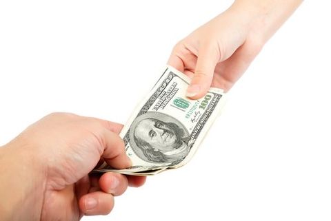 Giving Dollar Bill — Fairmont, WV — Pevler Law
