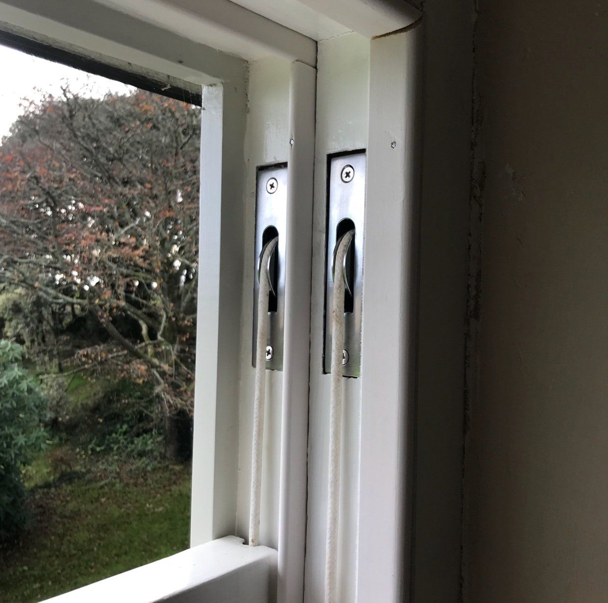 Sash window pulley in brushed chrome