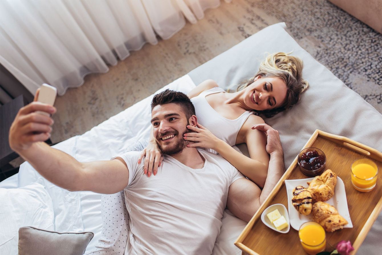 Happy Couple in Hotel
