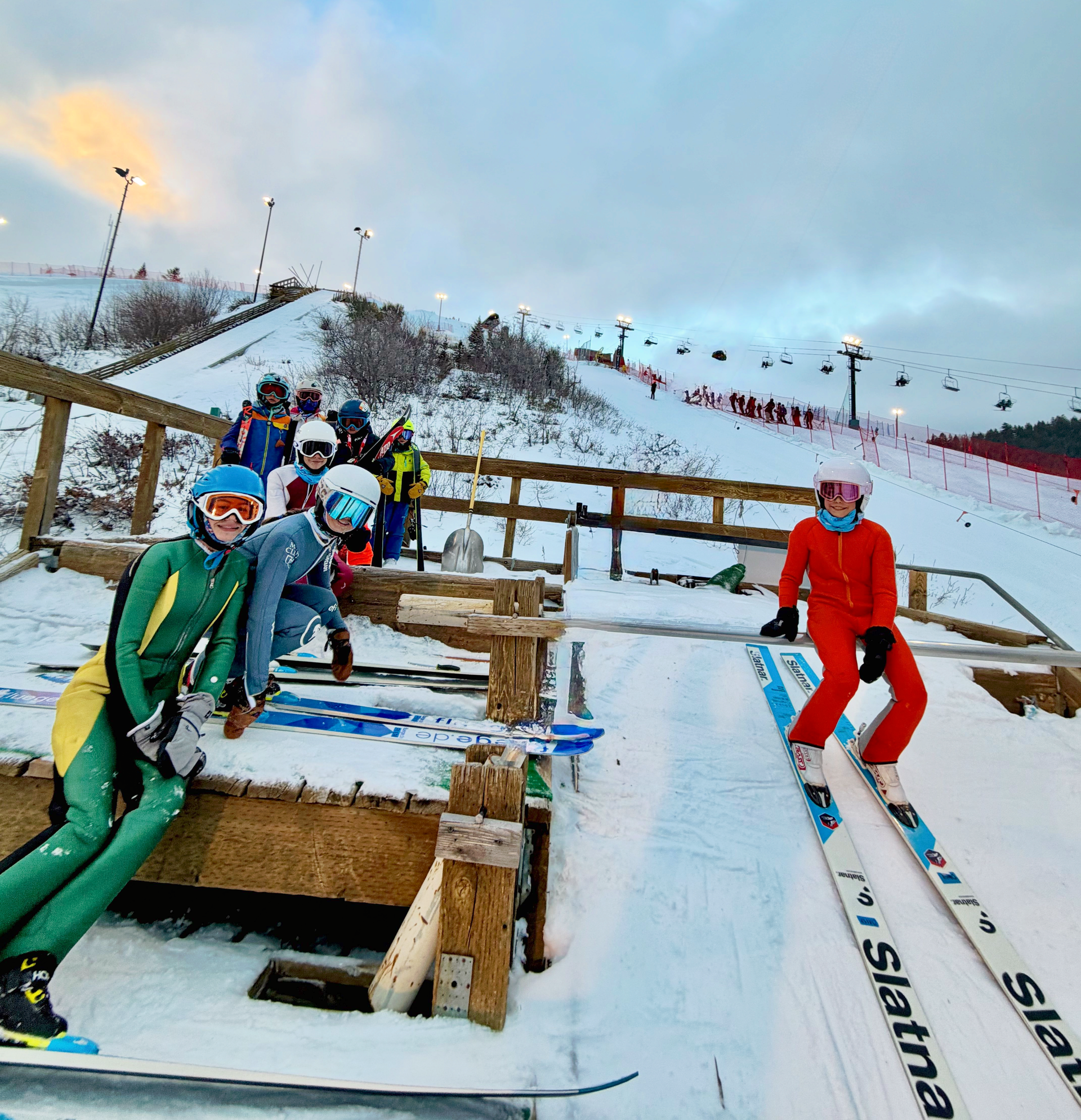 A typical busy night on the small hill ski jumps