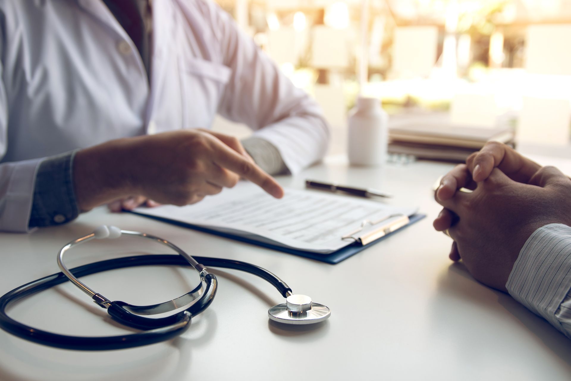 Doctor discussing health insurance with a patient in Boynton Beach, Florida