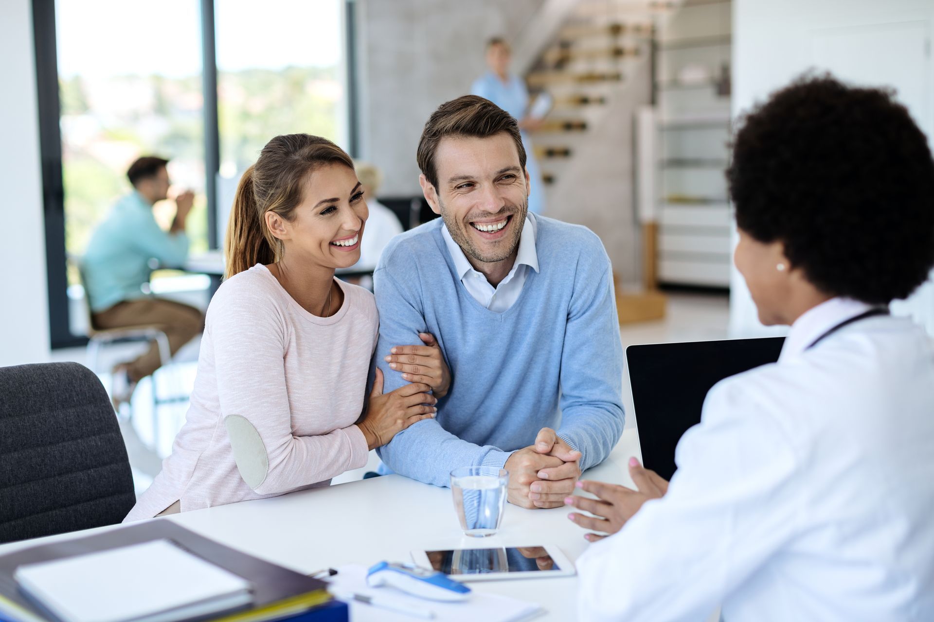Couple receiving health insurance consultation at Main Street America Insurance in Boynton Beach