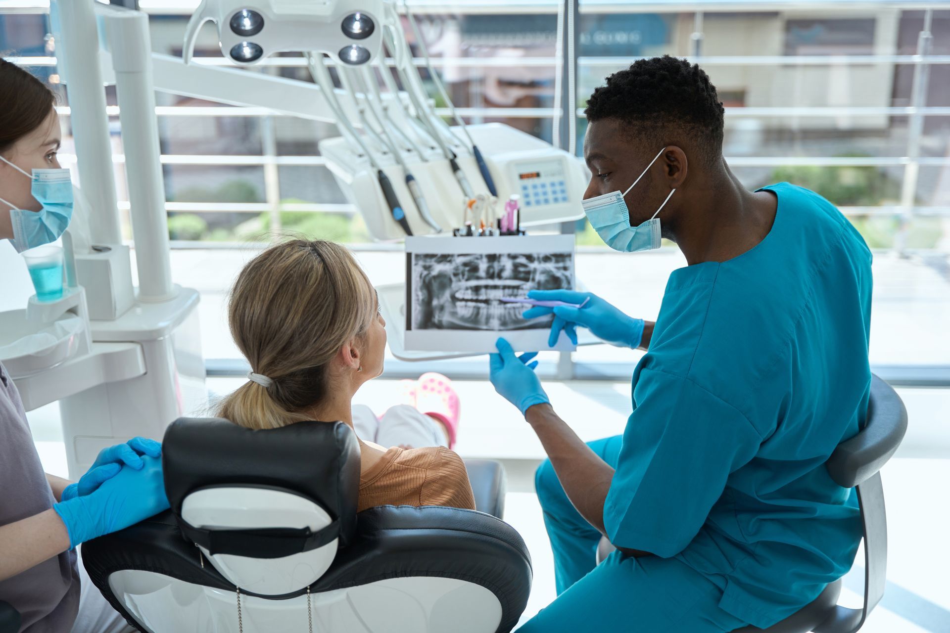 Physician and patient discussing coverage options — supplemental insurance consultation