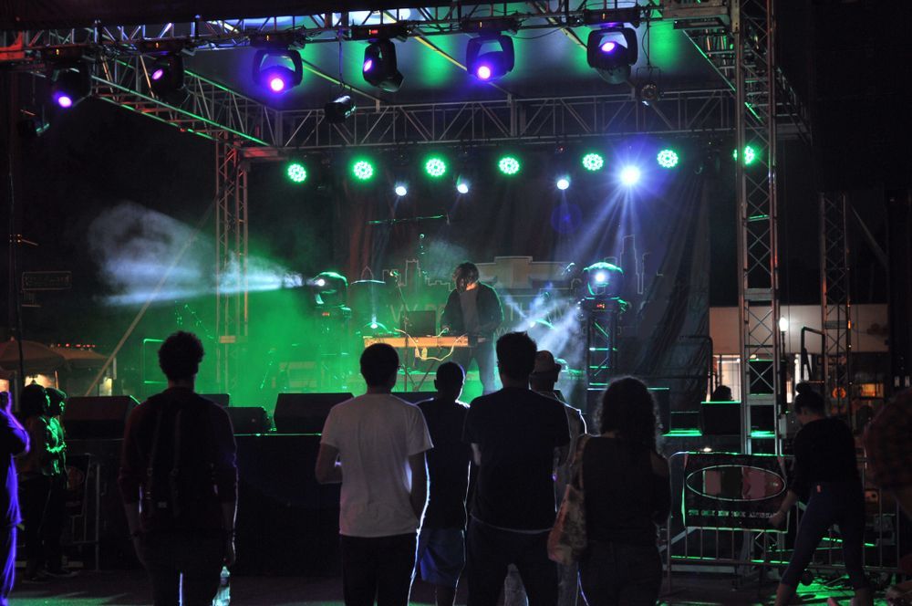 Concert Stage With Dj Performing, Audience Watching — Kennedy Amplifier Hire Service In South Mackay, QLD