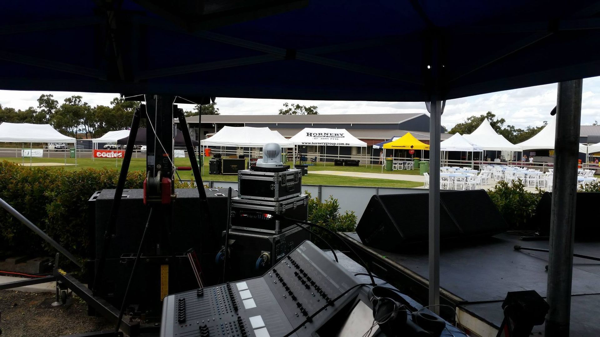 Outdoor Stage Setup With Sound Equipment — Kennedy Amplifier Hire Service In South Mackay, QLD