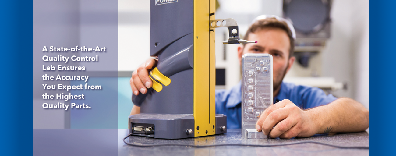 A man is working on a machine in a factory.