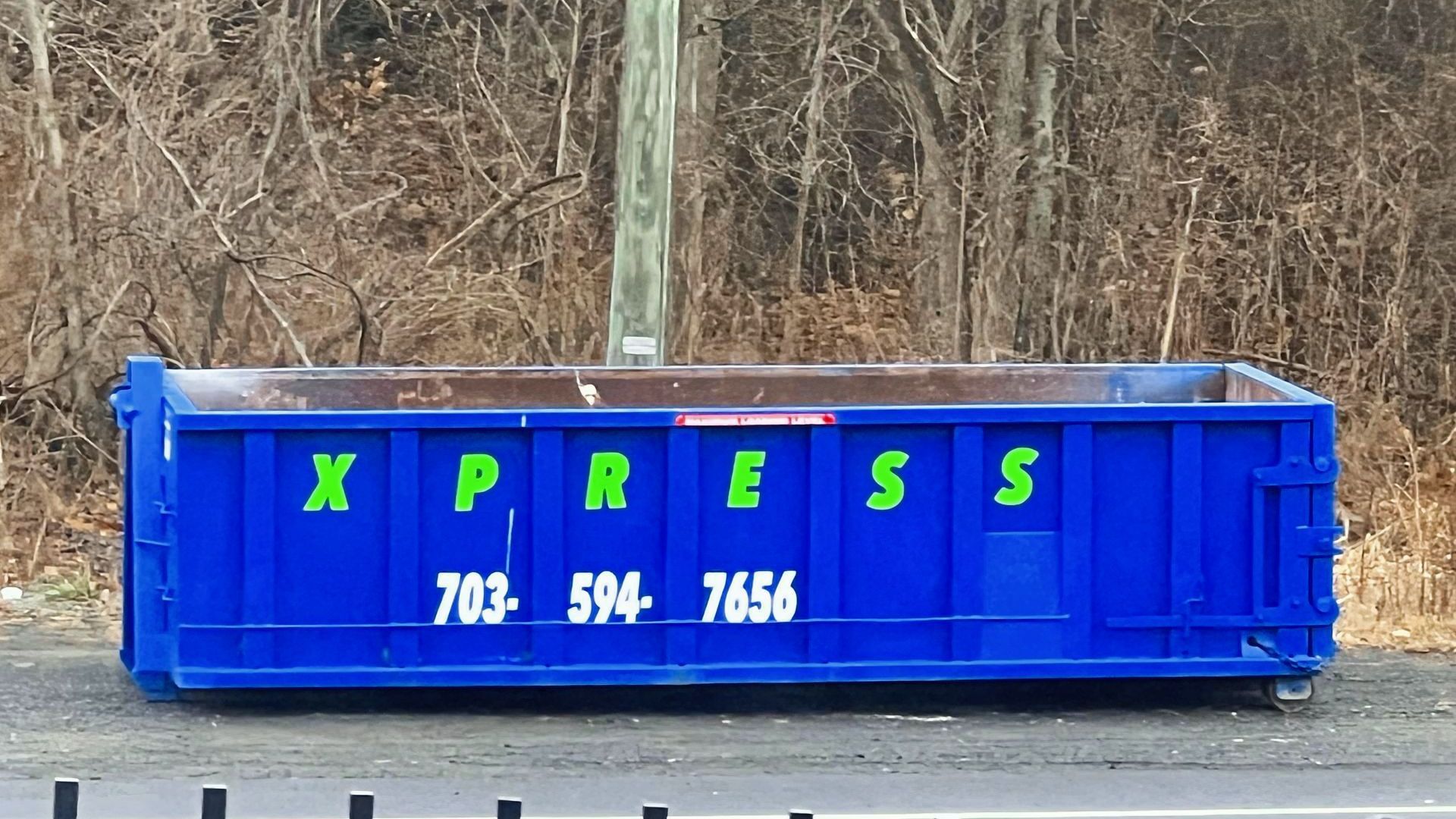 Xpress Dumpster Rentals Roll-Off Dumpster on a Construction Site in Warrenton, VA 20186