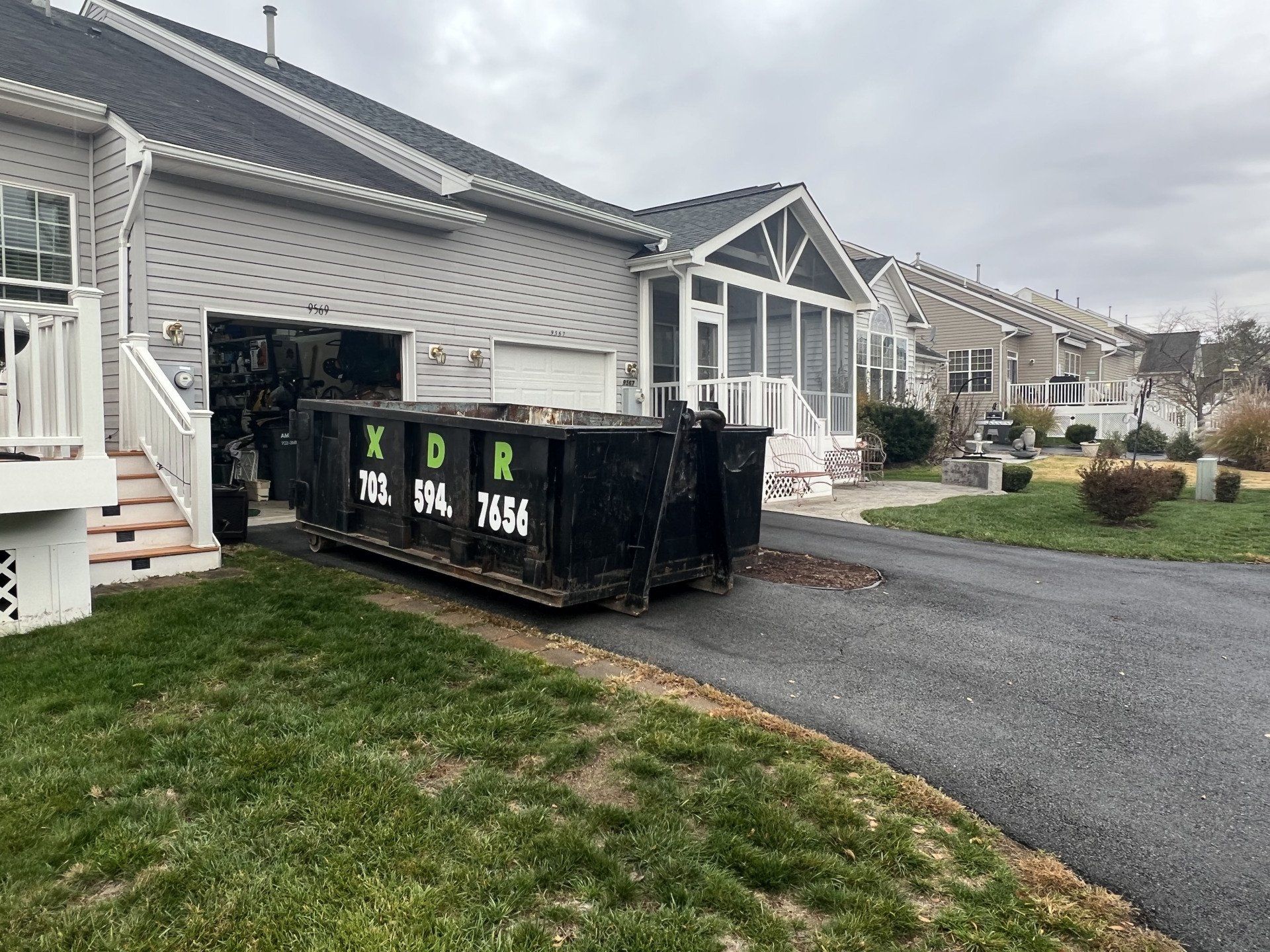 Bristow VA neighborhood with driveway-friendly dumpster rental from Xpress Dumpster Rentals”