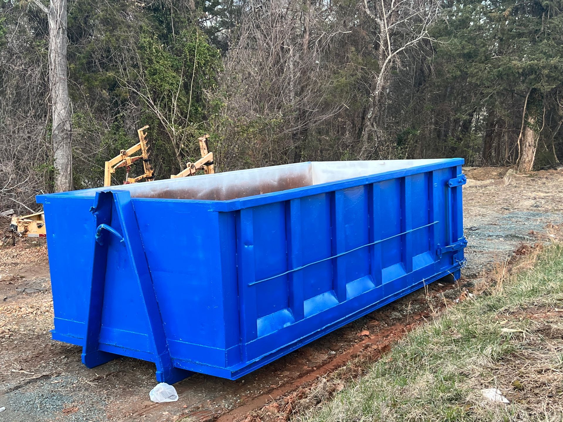 A 30 yard dumpster placed on a construction site in Culpeper, VA, ready for heavy-duty waste disposal.