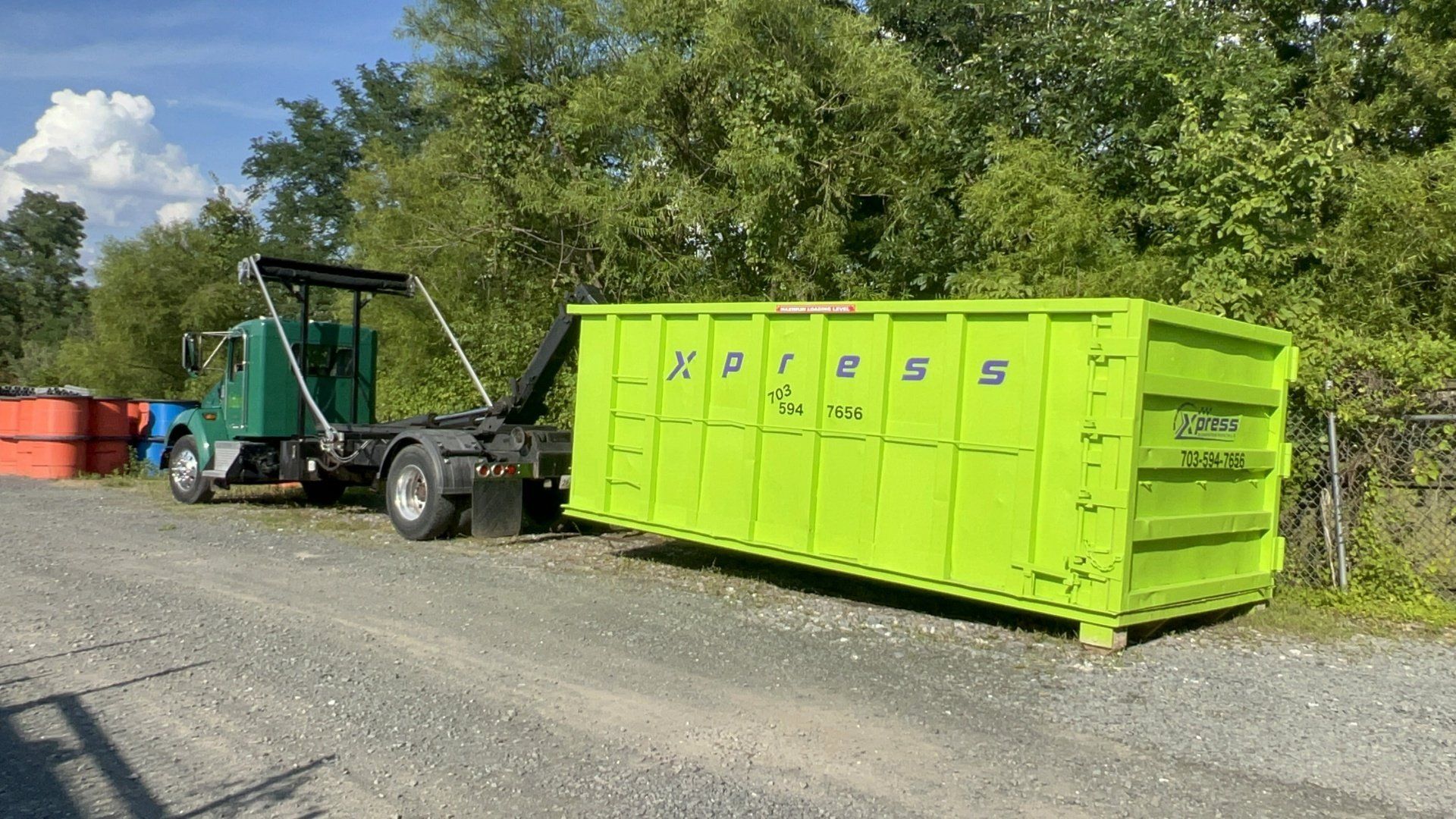 Commercial dumpster placed at a business site in Manassas, VA, ensuring clean and organized waste disposal.