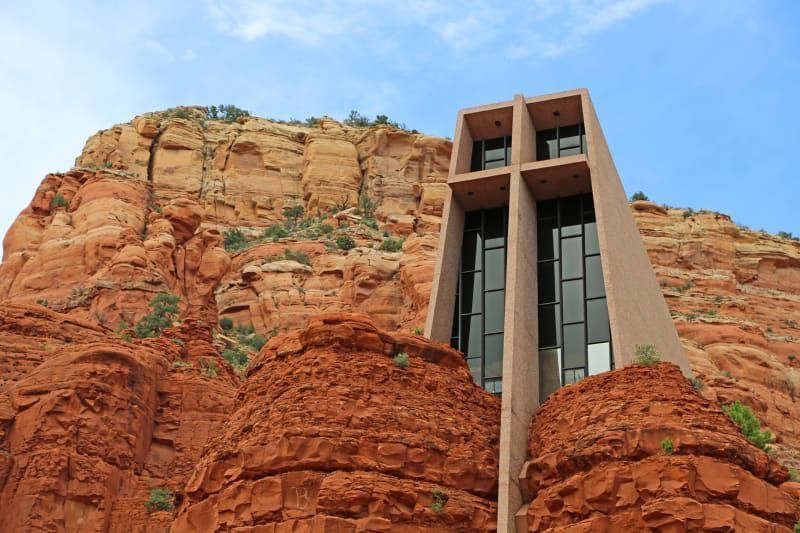 A church built into the side of a rocky mountain