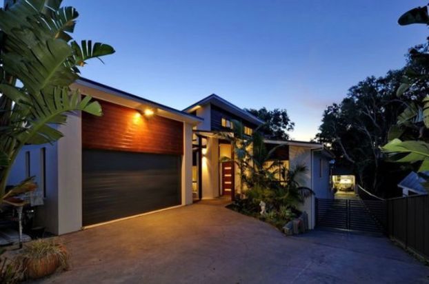 Modern Mansion With A Garage — Builders in Port Stephens, NSW