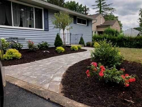 Beautifully paved hardscape installation and landscaping design