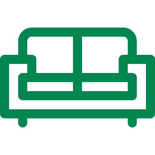 A green icon of a couch on a white background.