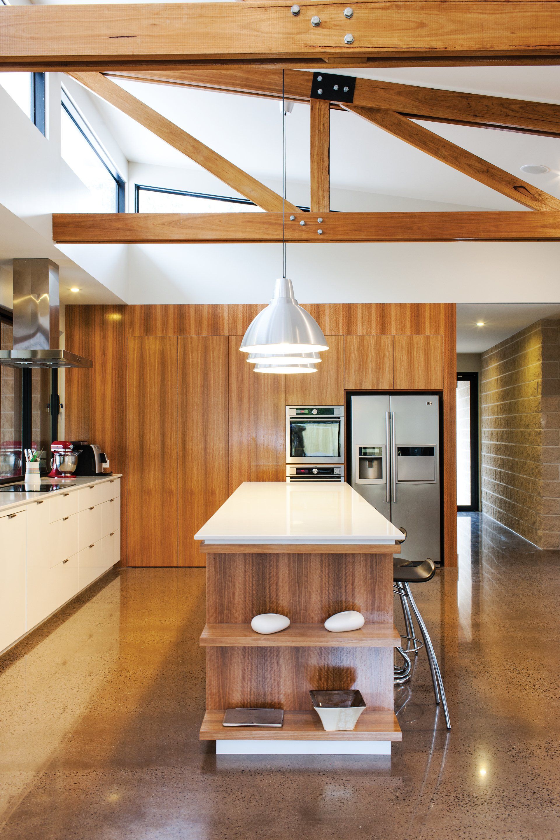 A kitchen with a large island in the middle of it