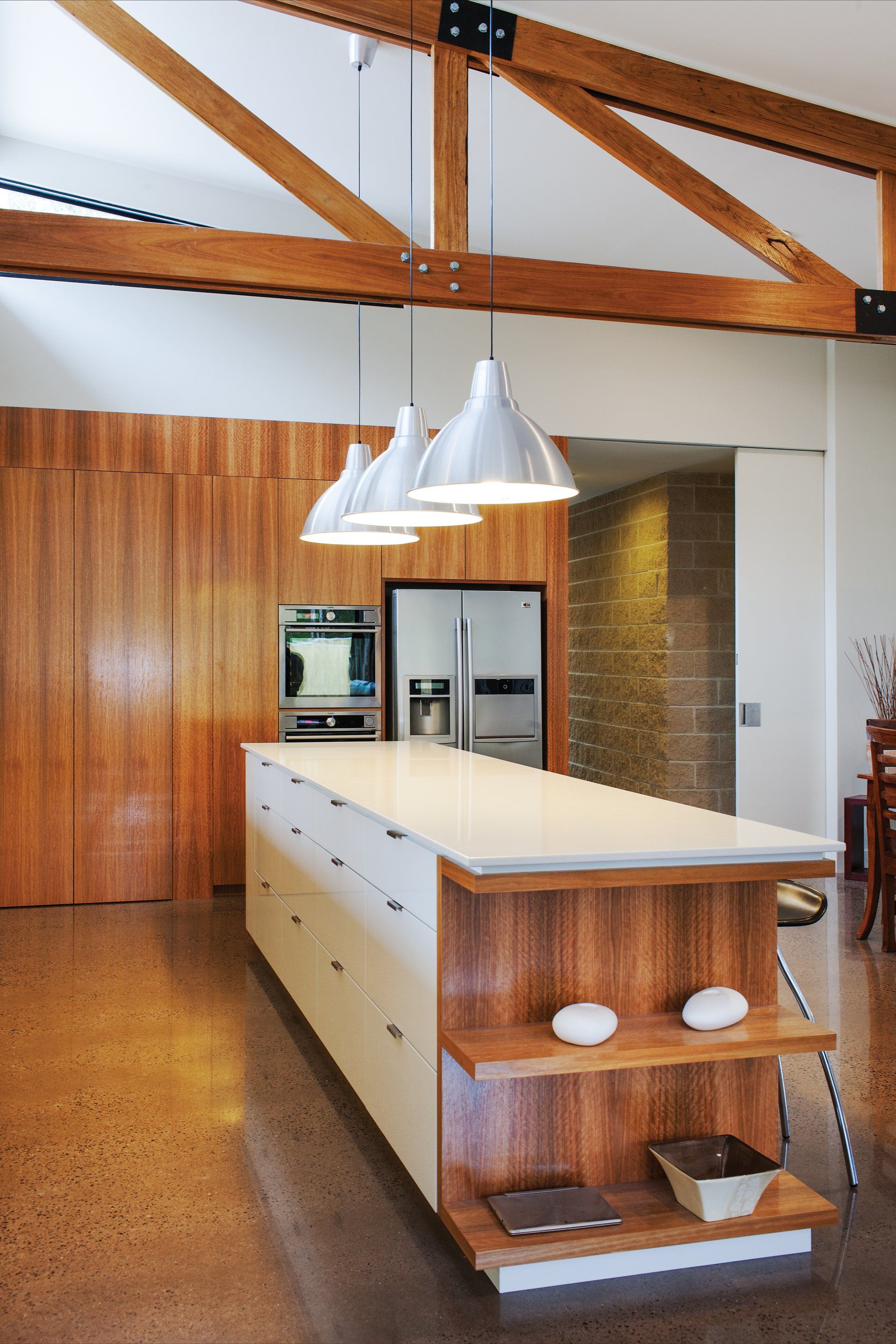 A kitchen with a large island in the middle of it