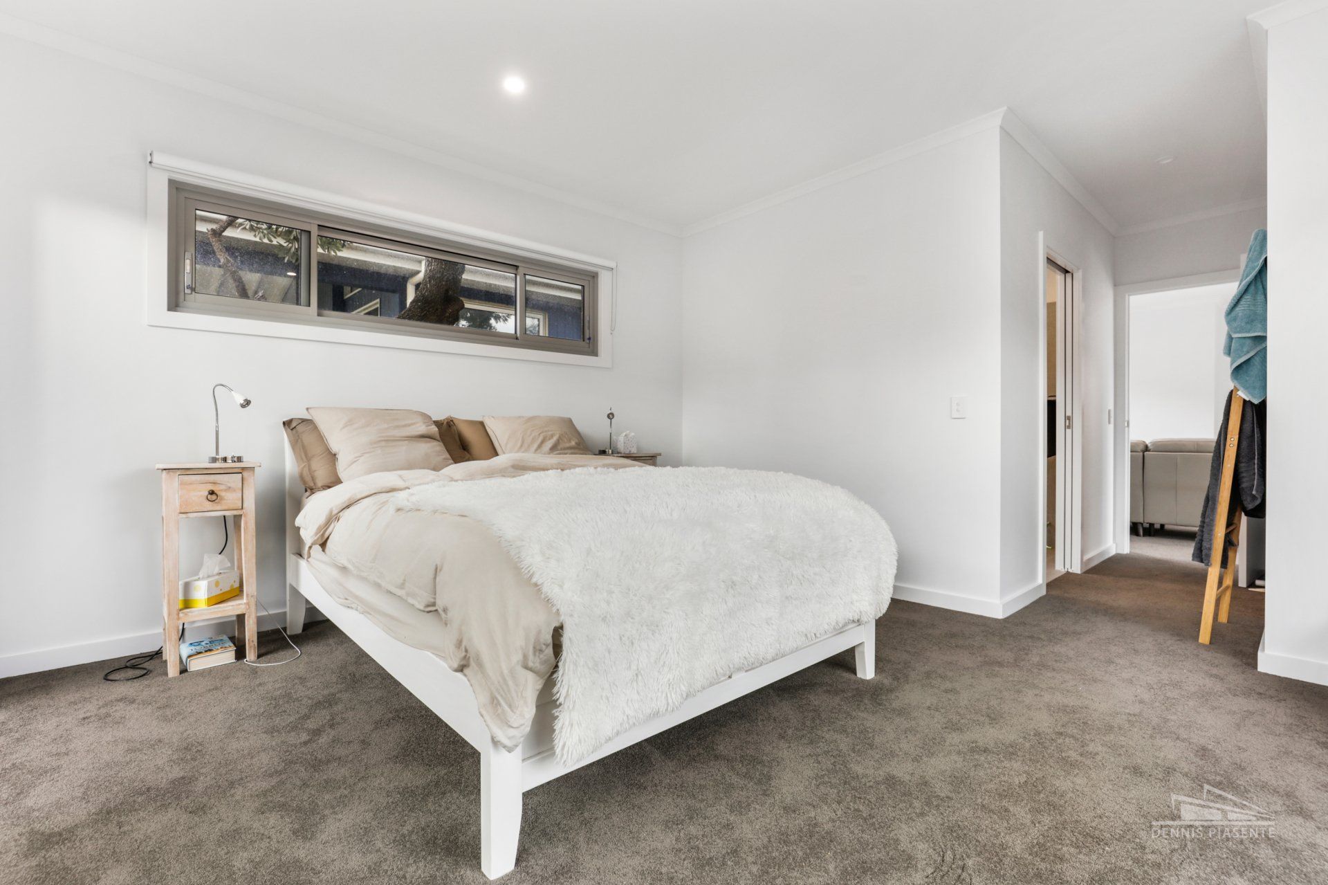 There is a large bed in the middle of the room.