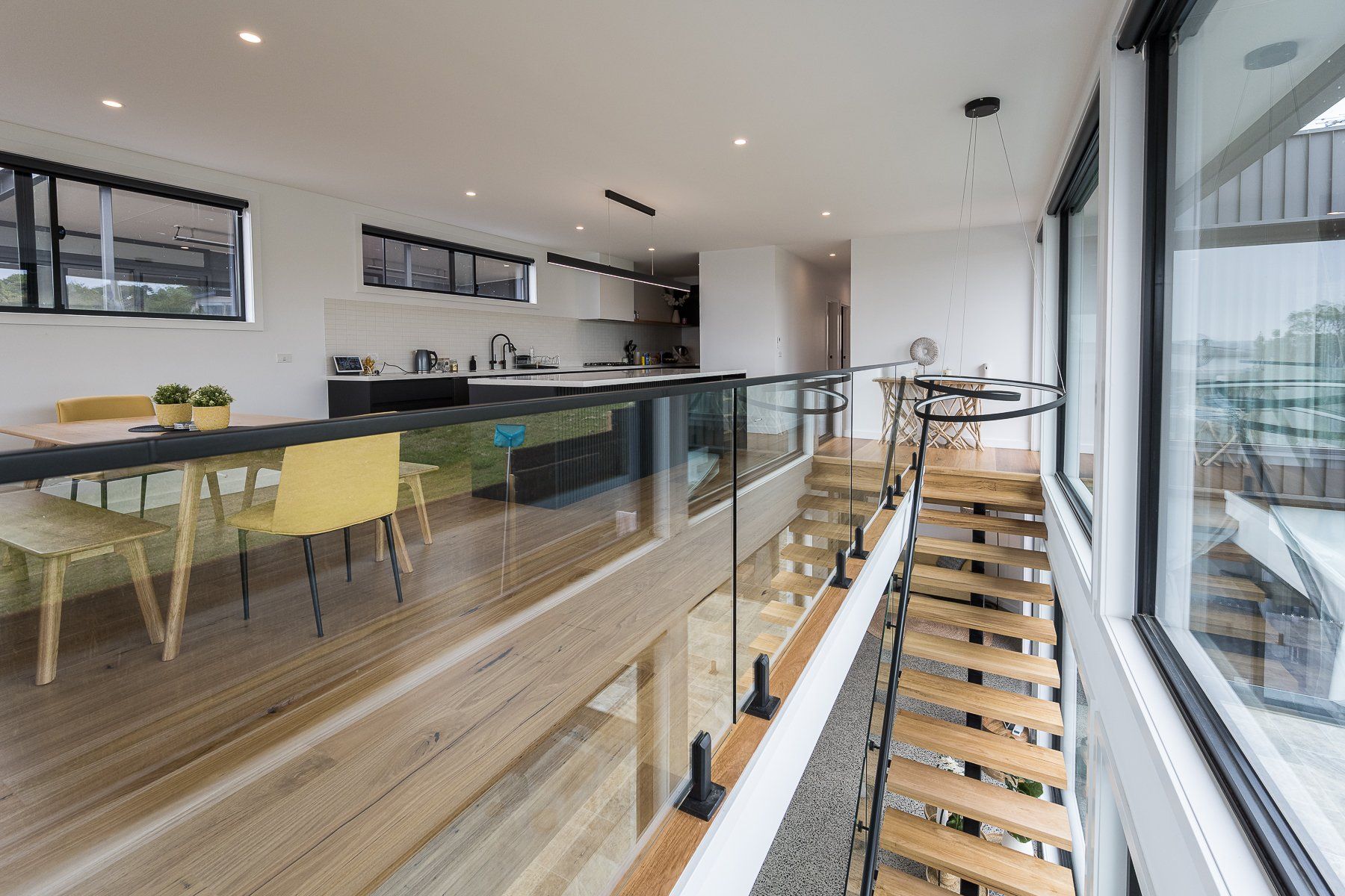 There is a staircase leading to the second floor of the house.