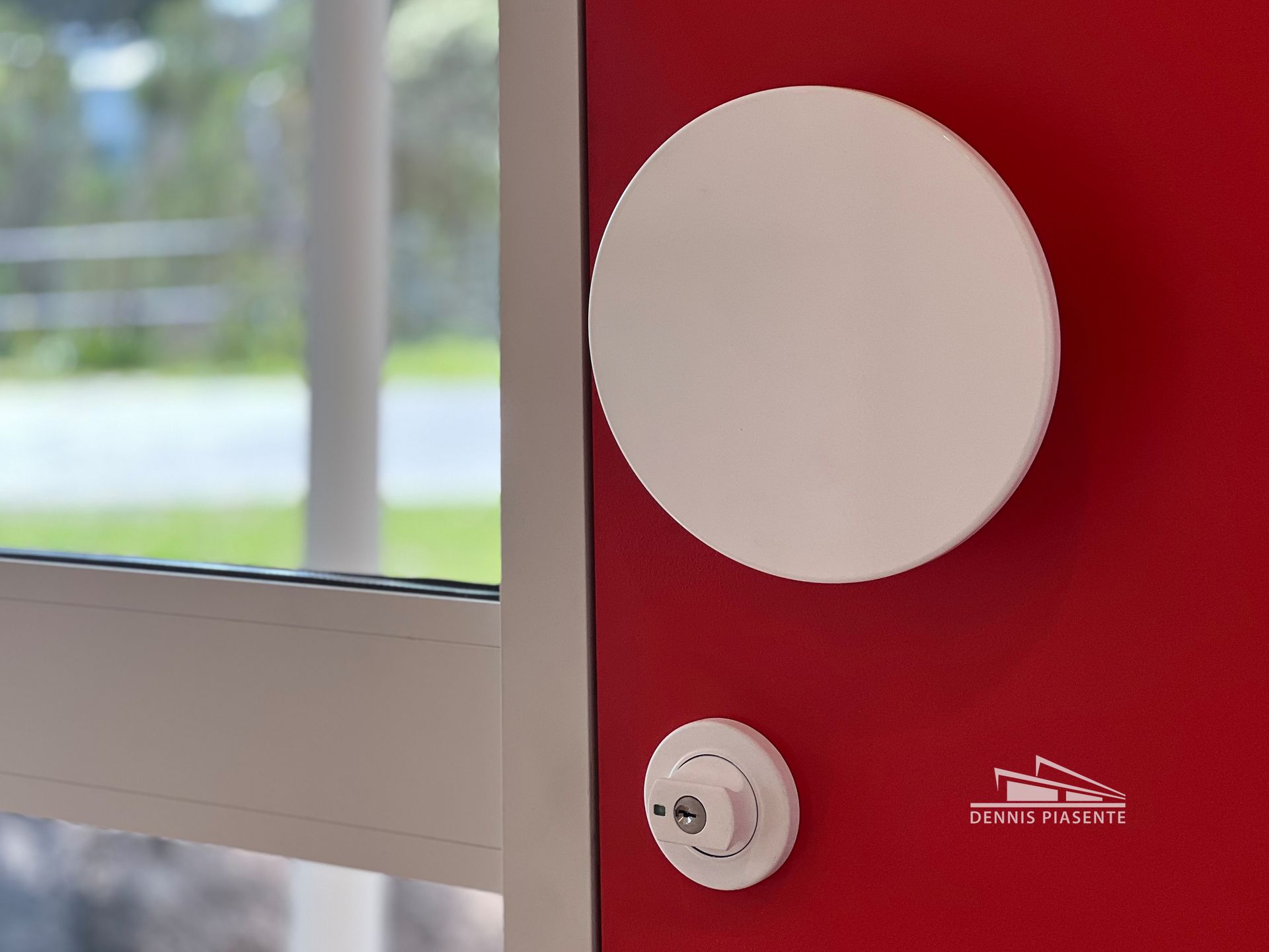 A red door with a white circle on it