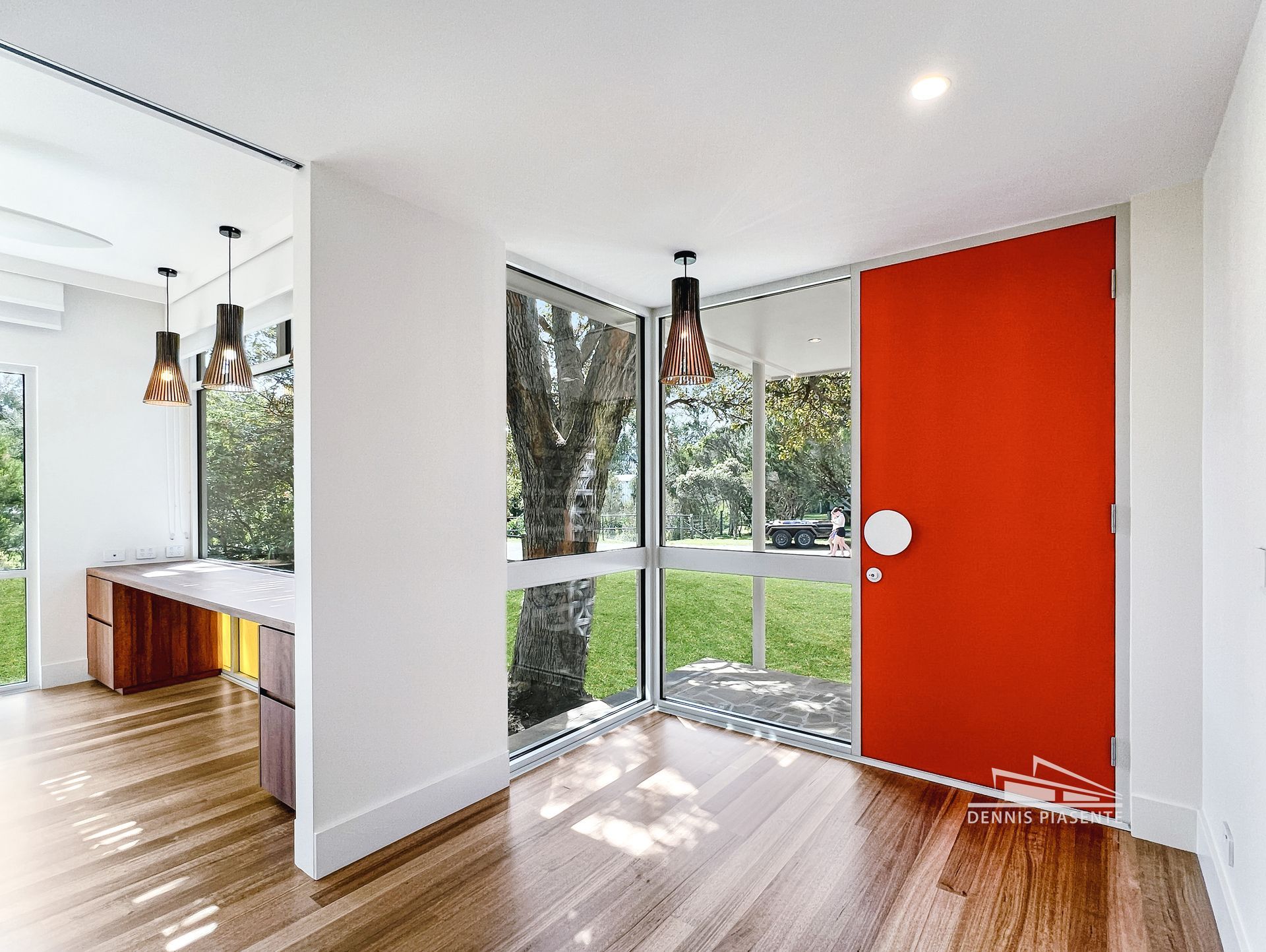 There is a red door in the middle of the room.