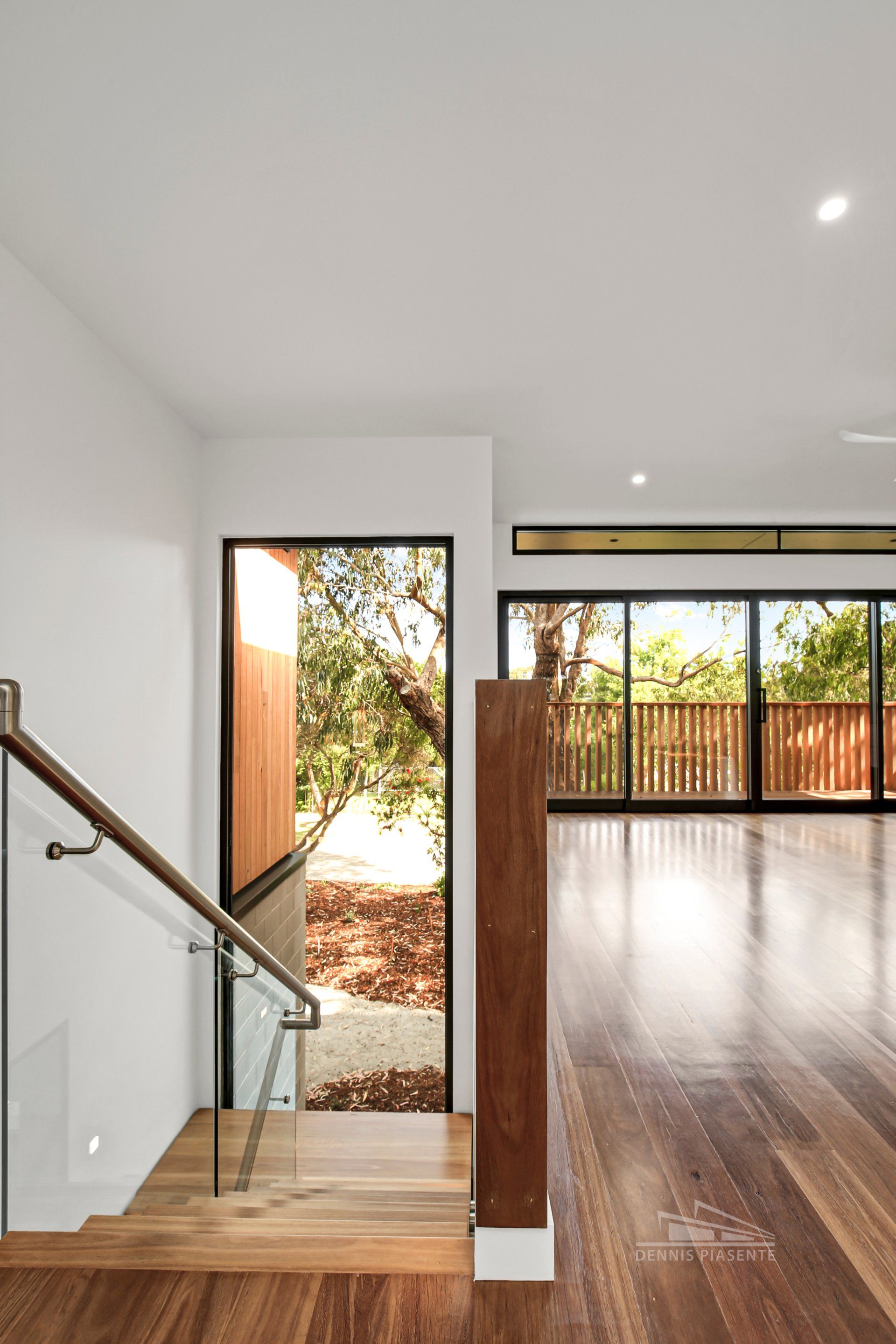 There is a staircase leading up to the second floor of a house.