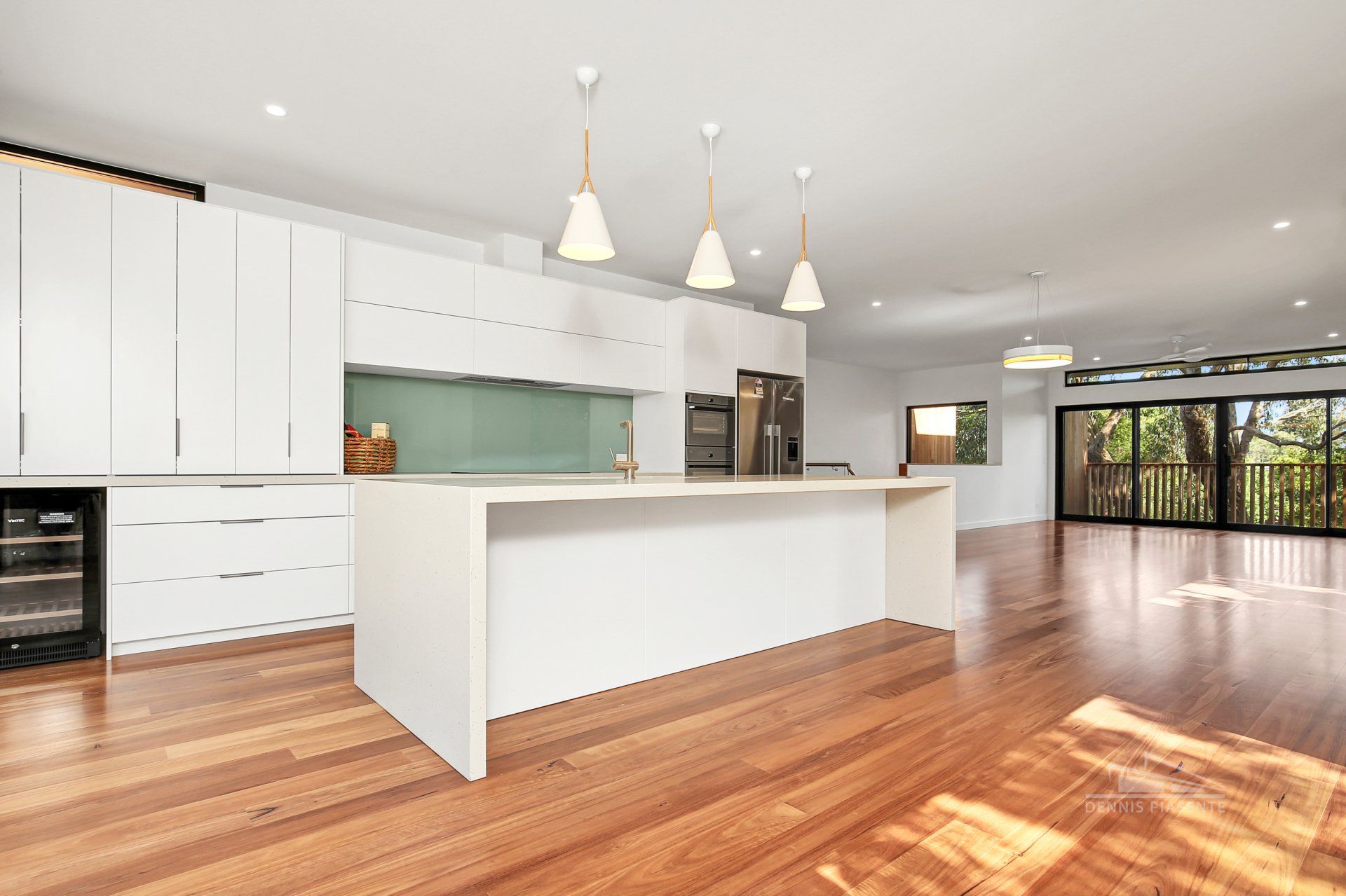 There is a large island in the middle of the kitchen.