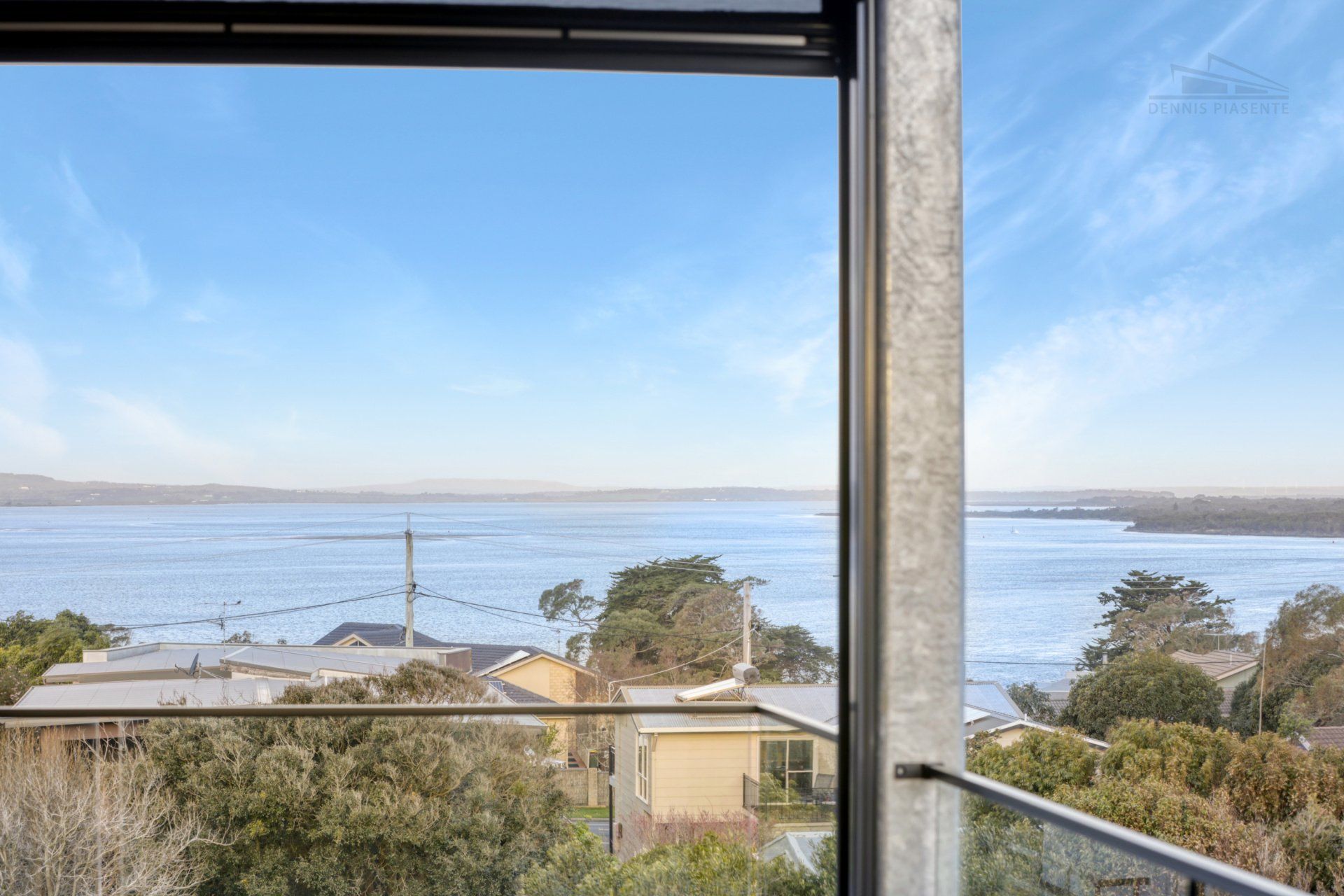 A view of a body of water from a balcony.