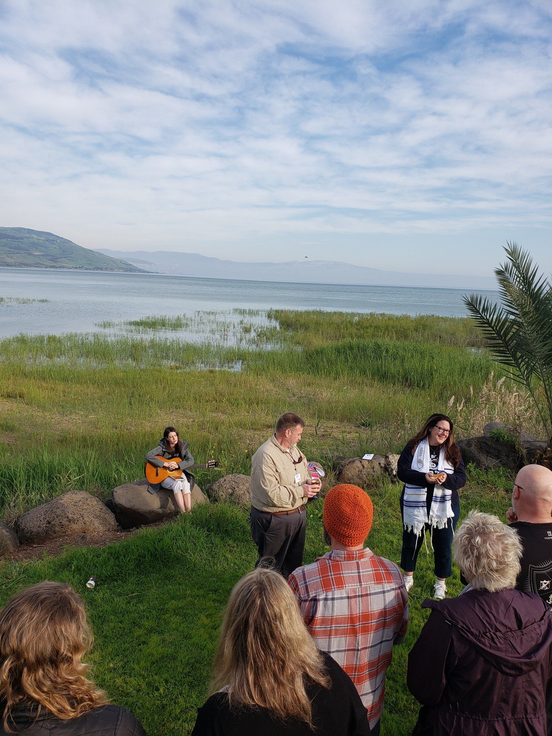 Pilgrimage prayer by the Sea of Galilee.