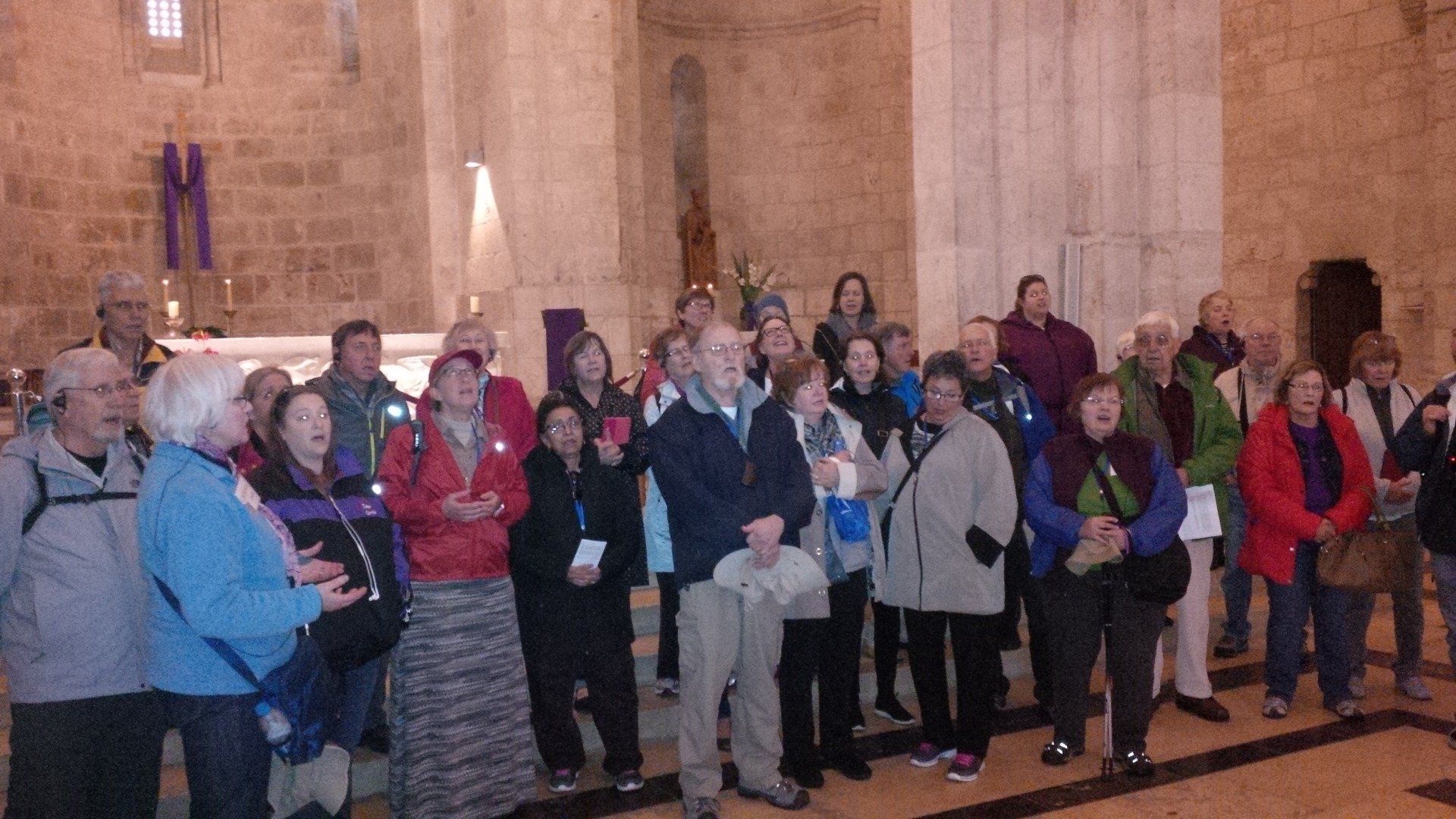 A group sings in St. Anne's Church in Jerusalem.