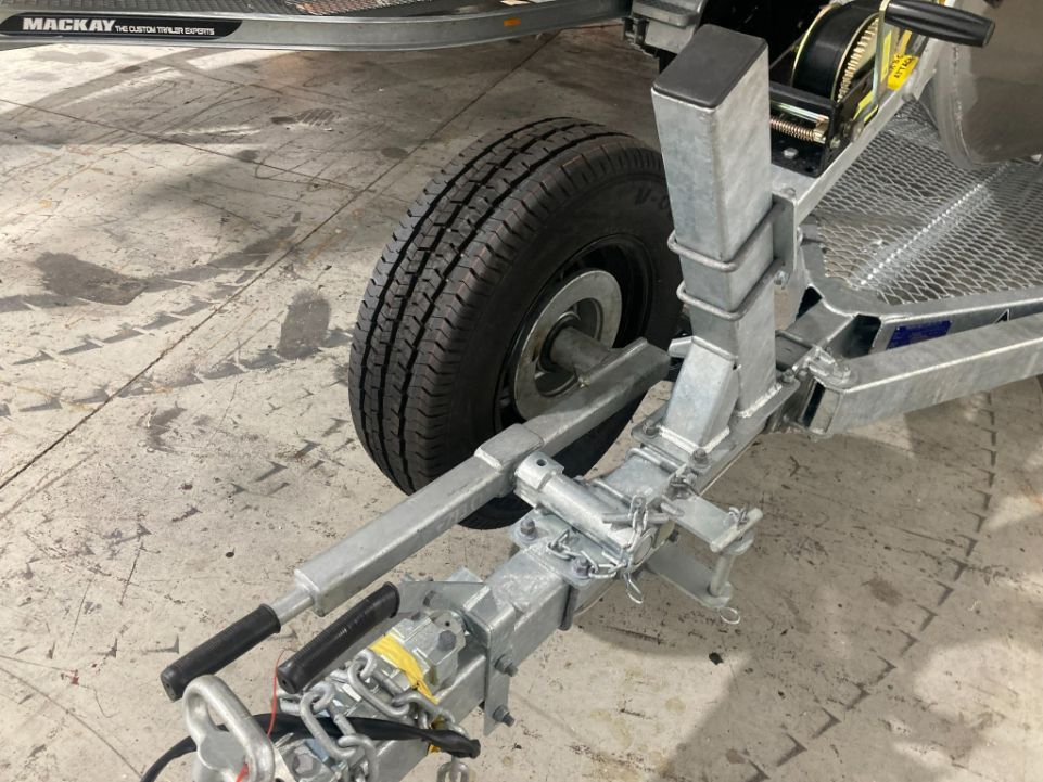 Boat Trailer Hitch and Wheel — In Tune Marine in Cairns, QLD