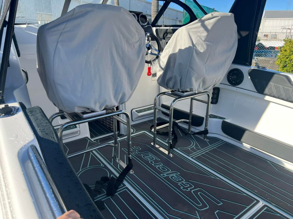 Boat Cockpit With Covered Seats, Stainless Steel Railings — In Tune Marine in Airlie Beach, QLD