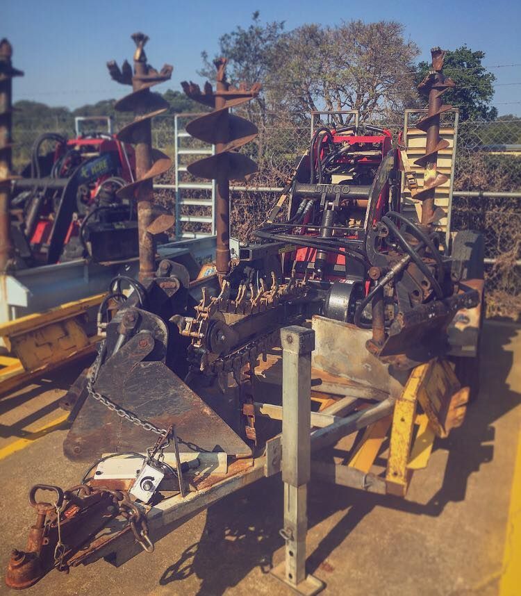 A Bunch Of Tractor Parts Are Sitting On The Ground — JC Hire In Nambour, QLD
