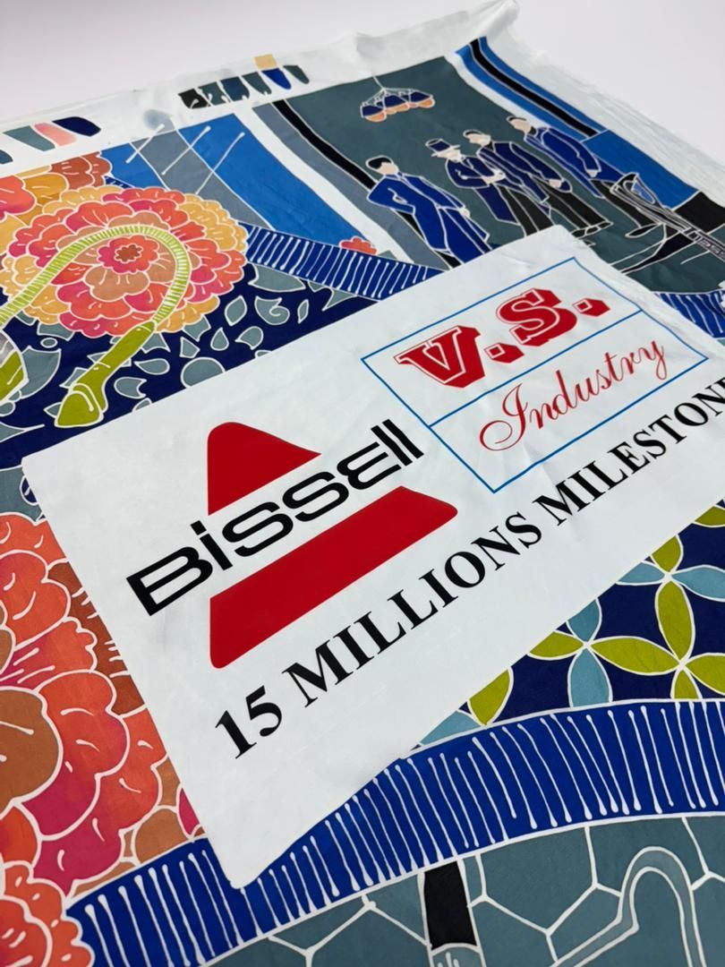 Heat press logo printing on batik fabric for custom corporate orders
