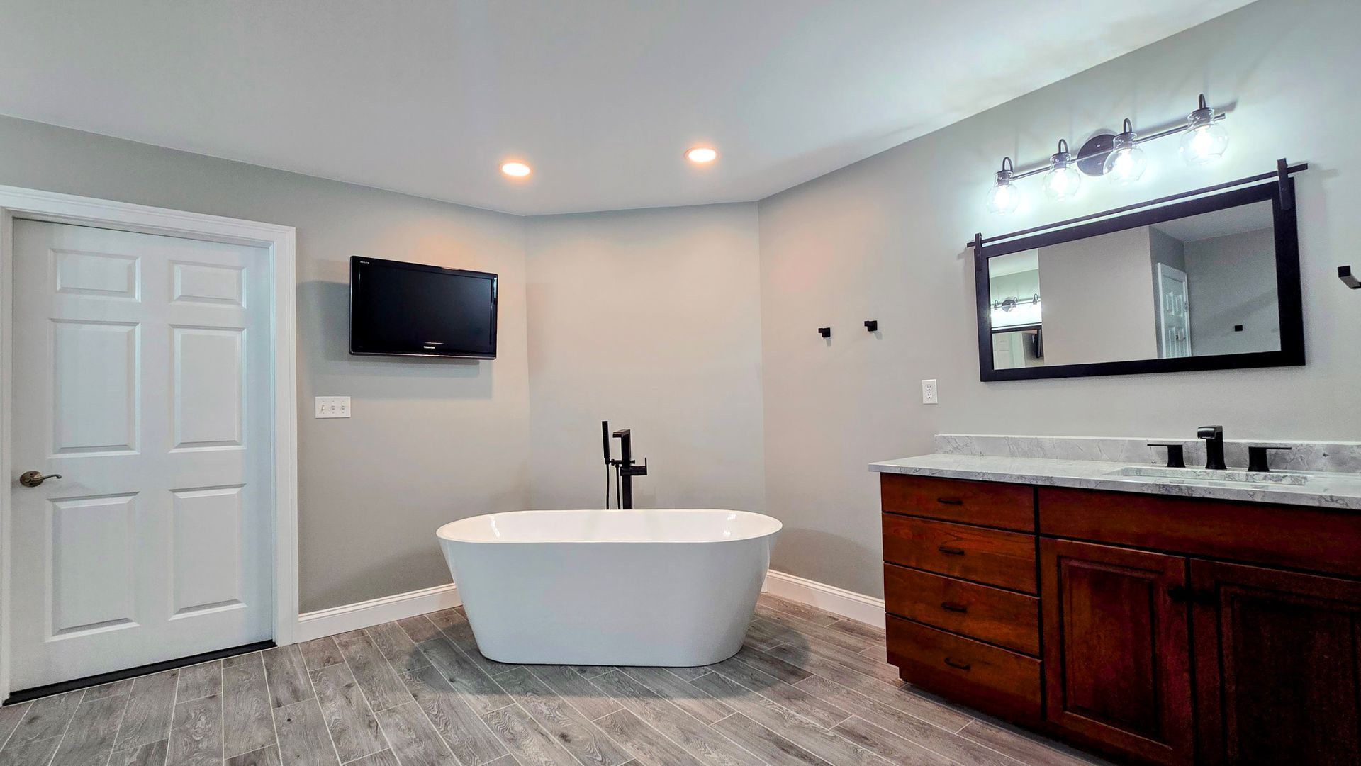 There is a bathtub replacement in Southington, CT in the middle of the bathroom.