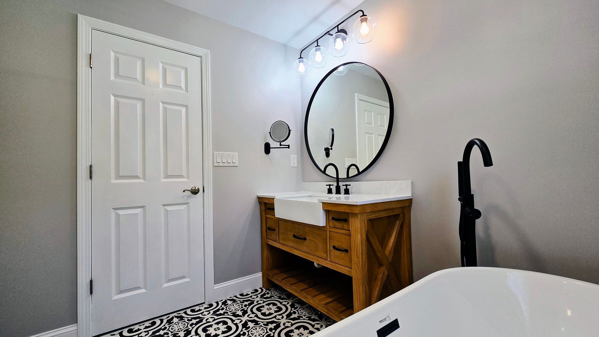A bathroom with a red jacuzzi tub in the corner