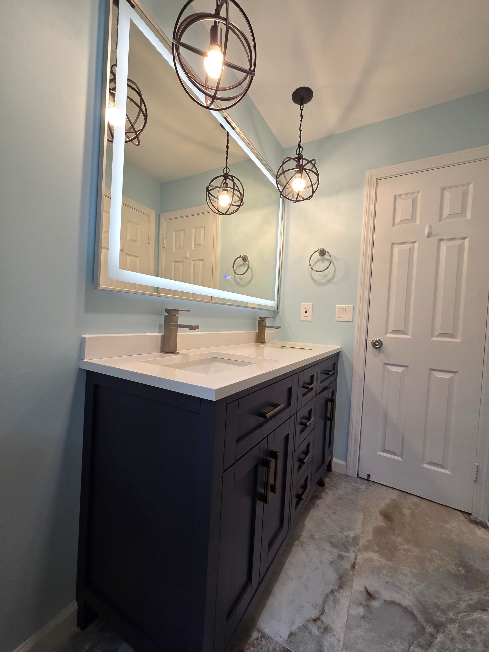 A shower with a bench and a shower head